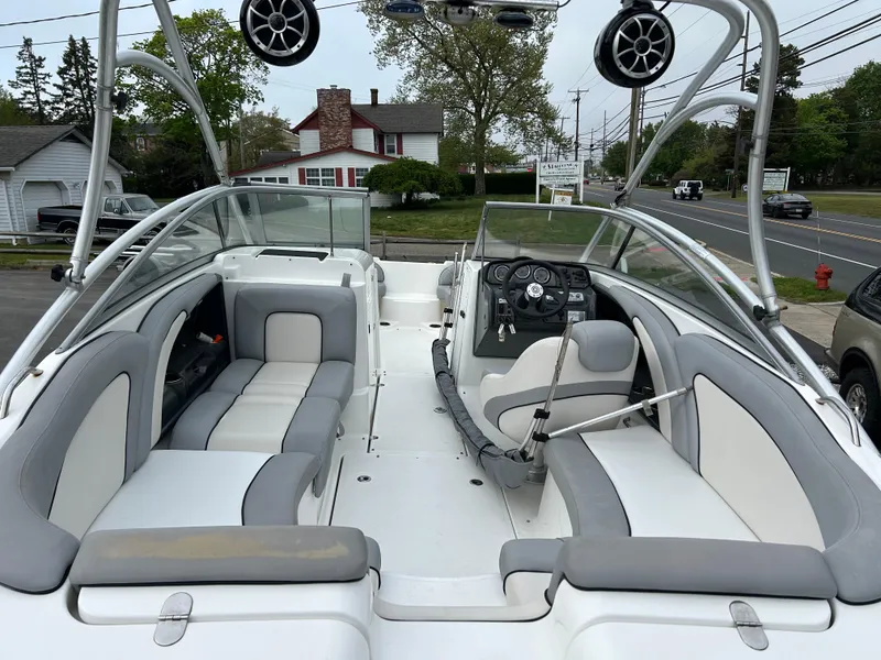 Slide: The Image of 2012 Yamaha Boats AR240 interior with seating and dashboard. - 8