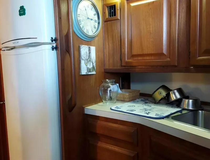 Slide: The Image of 1988 Viking 41 Convertible kitchen with wooden cabinets and countertop. - 12