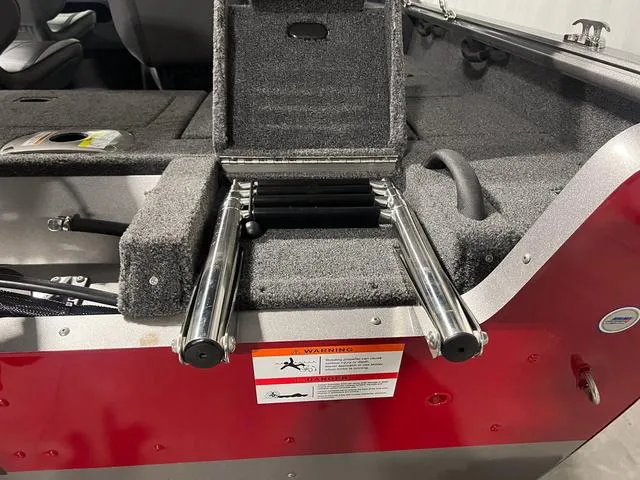 Slide: The Image of 2024 Lund 1775 Impact XS Sport boat with foldable ladder and storage compartment. - 10