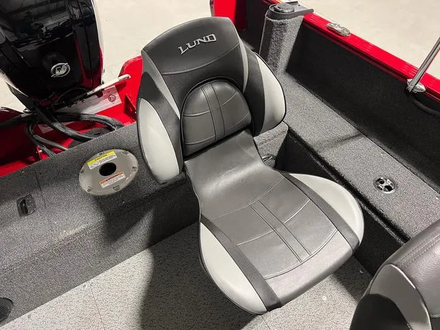 Slide: The Image of 2024 Lund 1650 Rebel XL Sport boat seat and interior. - 14