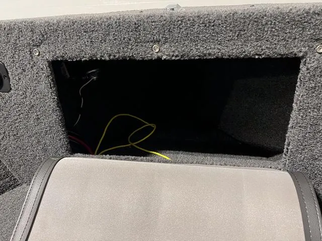 Slide: The Image of 2024 Lund 1650 Rebel XL Sport storage compartment with wiring. - 29