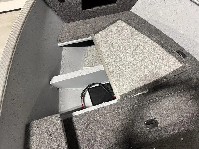 Slide: The Image of 2024 Lund 1600 Fury Tiller boat interior storage compartment. - 10