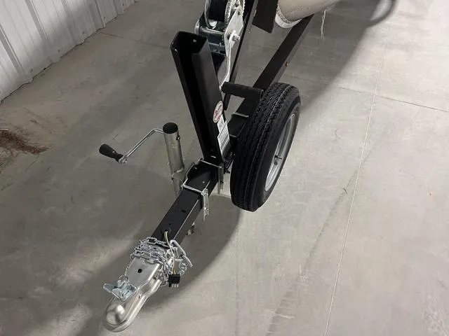 Slide: The Image of 2024 Lund 1600 Fury Tiller boat trailer hitch and wheel. - 13