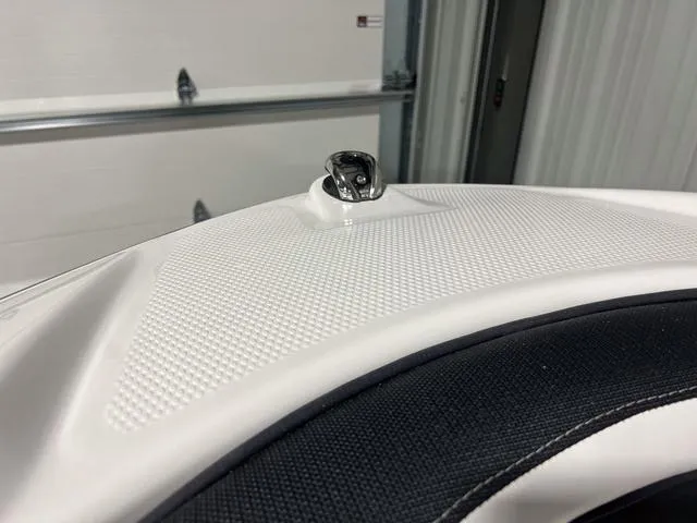 Slide: The Image of Close-up of 2024 Yamaha Boats SX195 textured deck and cleat. - 31