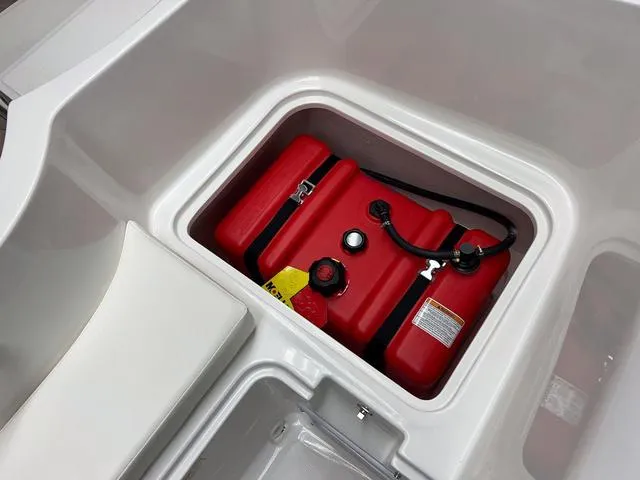 Slide: The Image of Bayliner E16 LTD 2024 boat fuel tank compartment with red fuel tank. - 10