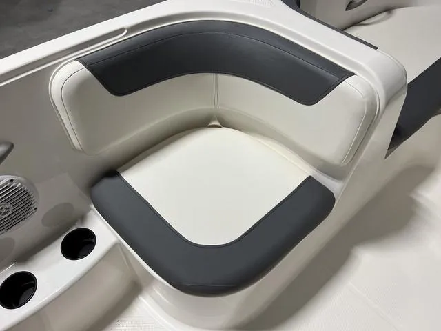 Slide: The Image of 2024 Bayliner E18 LTD boat seating with cup holders and speaker - 16