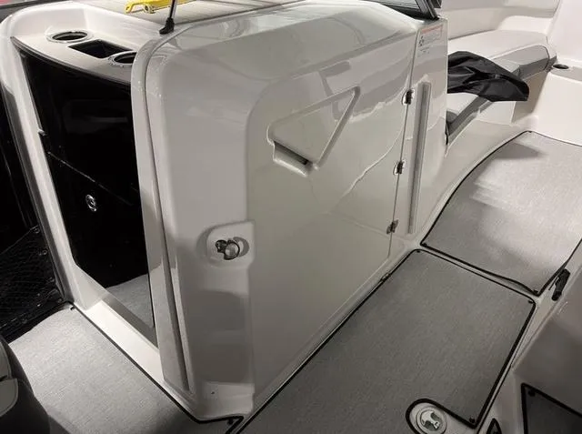 Slide: The Image of 2024 Yamaha Boats AR250 interior, featuring sleek design and modern amenities. - 16