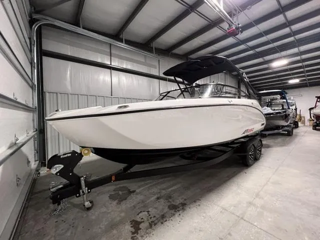 Slide: The Image of 2024 Yamaha Boats AR250 in a storage facility. - 2