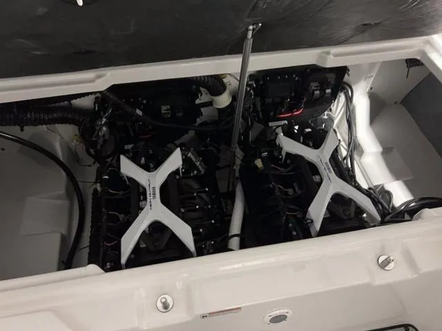 Slide: The Image of 2024 Yamaha Boats AR250 engine compartment with dual engines. - 6