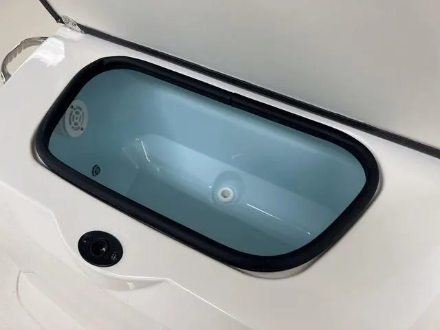 Slide: The Image of 2023 Stingray 173CC livewell compartment with open lid. - 18