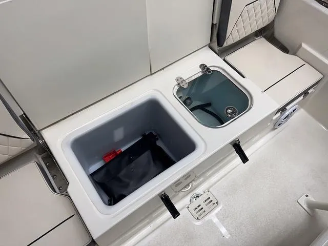 Slide: The Image of 2023 Stingray 173CC boat with storage compartments and livewell. - 7