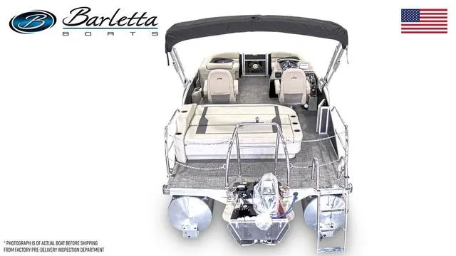 Slide: The Image of 2024 Barletta Boats Aria 20UC pontoon boat, rear view, with seating and motor. - 3