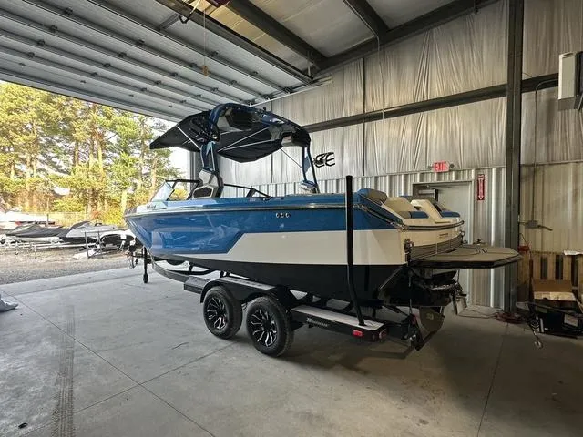Slide: The Image of 2024 Nautique Super Air Nautique GS22 boat in a storage facility. - 37