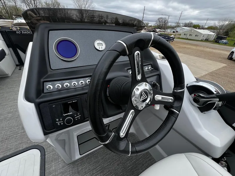 Slide: The Image of Steering console of a 2022 Viaggio 23U Diamante boat with modern controls and dashboard. - 10