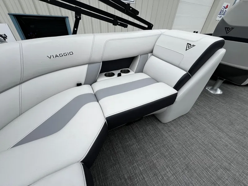 Slide: The Image of 2022 Viaggio 23U Diamante boat interior with white and gray seating. - 18