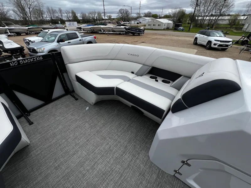 Slide: The Image of Interior of 2022 Viaggio 23U Diamante boat with white and gray seating. - 7