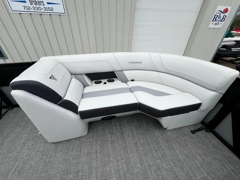 Slide: The Image of Viaggio 23U Diamante 2022 boat interior with white and gray seating. - 8