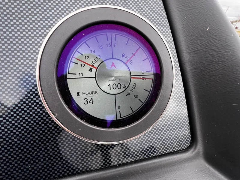 Slide: The Image of Close-up of 2022 Viaggio 23U Diamante dashboard gauge showing fuel, volts, trim, and hours. - 9