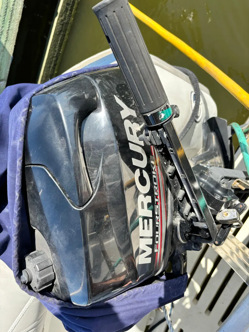 Slide: The Image of Mercury FourStroke outboard motor on a 1987 Silverton AFT CABIN boat. - 10