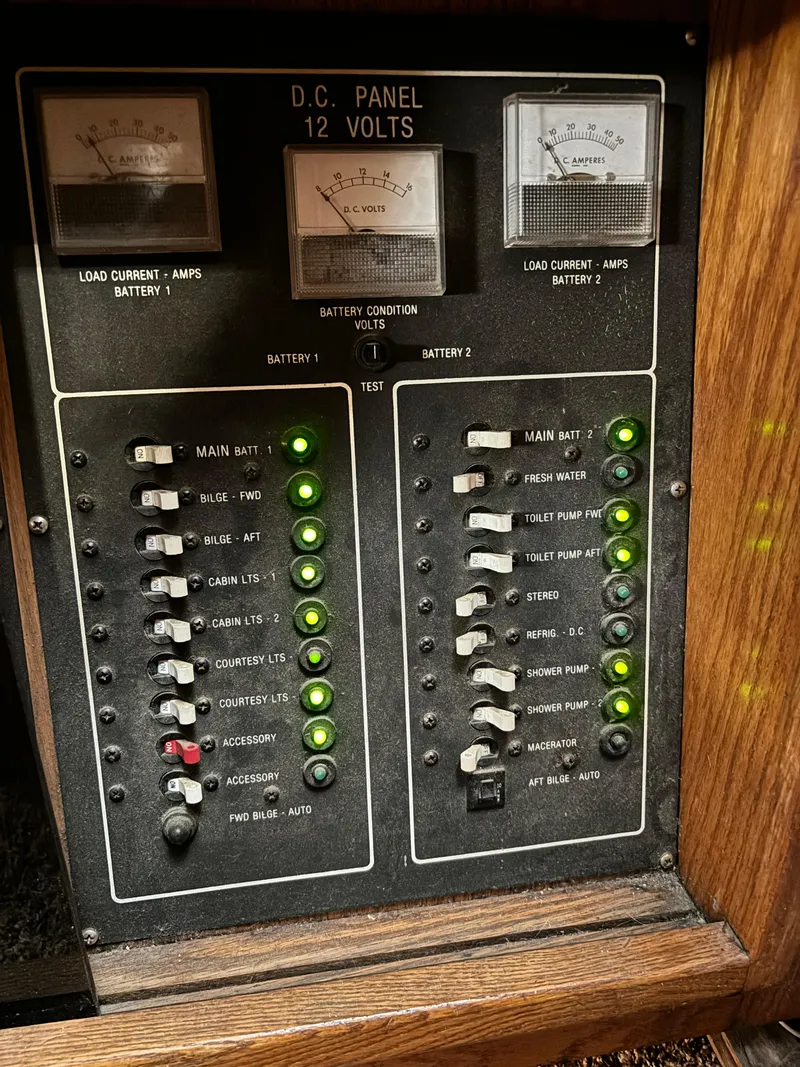 Slide: The Image of 1987 Silverton AFT CABIN DC panel with switches and indicators. - 40
