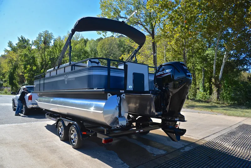 Slide: The Image of 2023 Viaggio DM20F pontoon boat on trailer with Mercury outboard motor. - 10