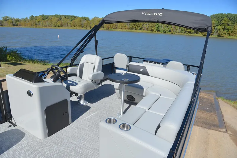 Slide: The Image of 2023 Viaggio DM20F pontoon boat with spacious seating and lake view. - 19