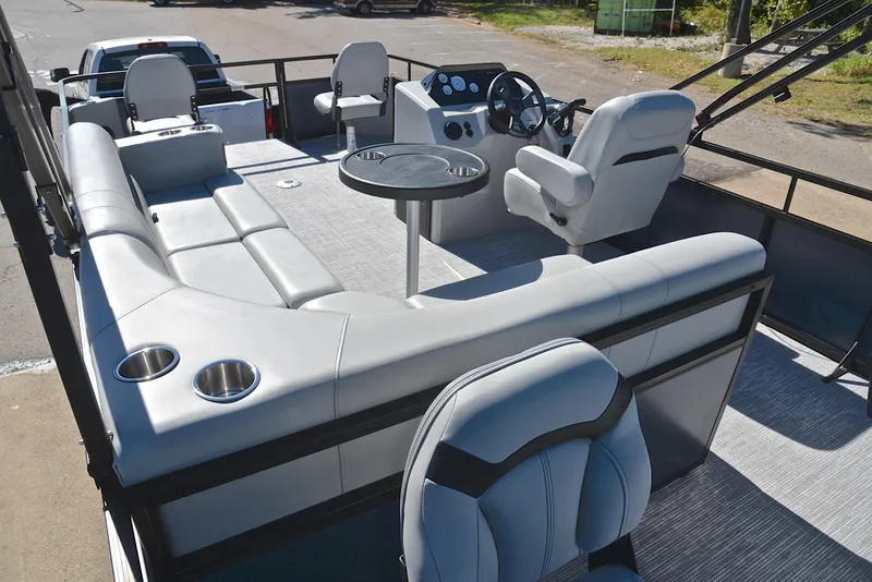 Slide: The Image of 2023 Viaggio DM20F pontoon boat interior with seating and steering console. - 21