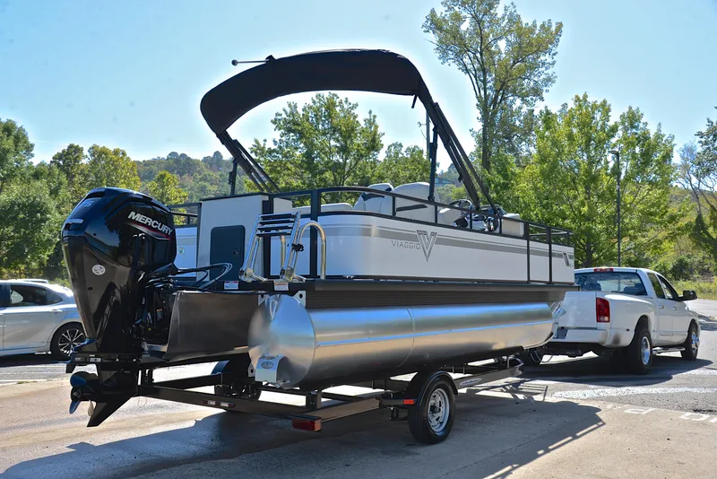 Slide: The Image of 2023 Viaggio DM18F pontoon boat on trailer with Mercury outboard motor. - 14