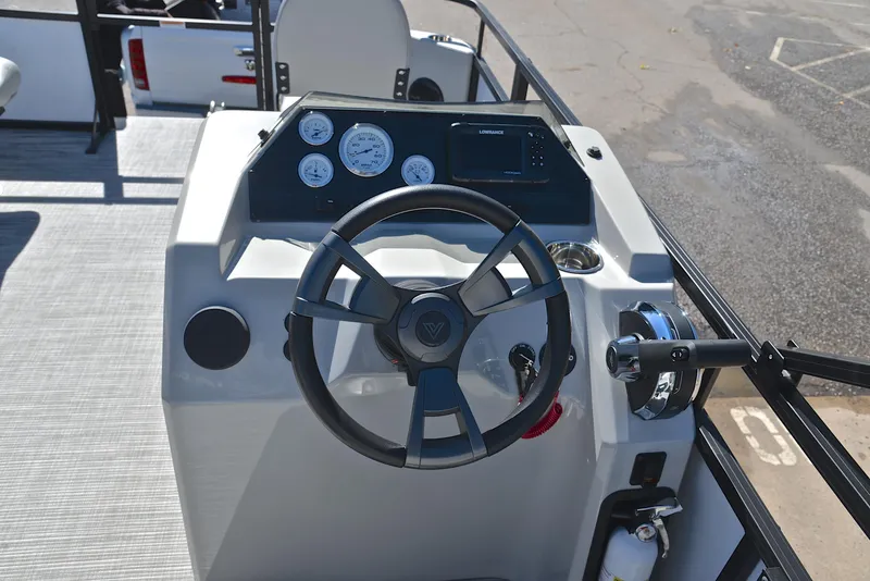 Slide: The Image of 2023 Viaggio DM18F boat dashboard with steering wheel and instrument panel. - 23