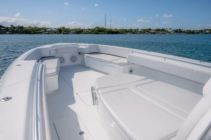 Slide: The Image of 2023 Contender 44 ST boat on calm water. - 13