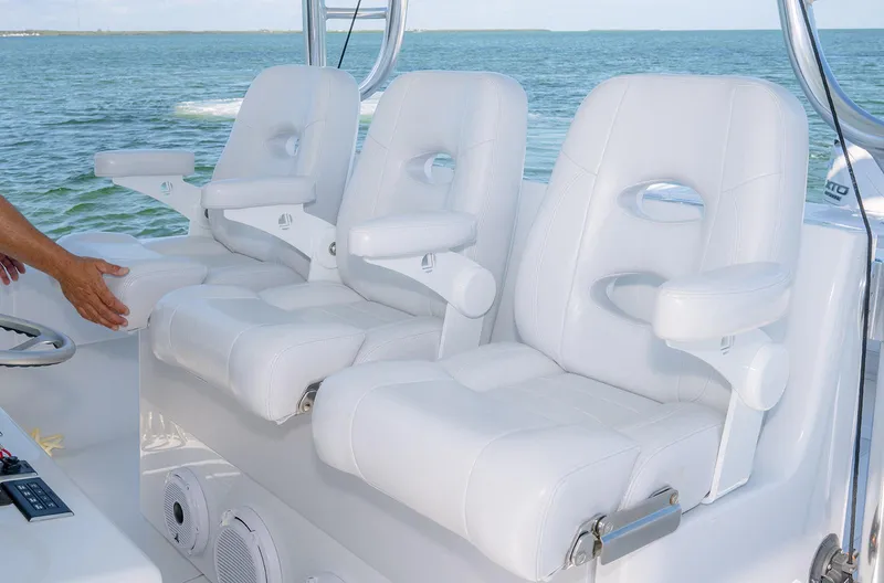 Slide: The Image of White seats on a 2023 Contender 44 ST boat. - 17