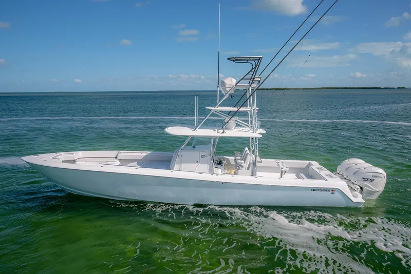 Slide: The Image of 2023 Contender 44 ST boat cruising on open sea. - 21