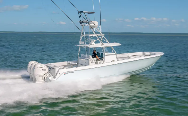 Slide: The Image of 2023 Contender 44 ST boat speeding on open water. - 4
