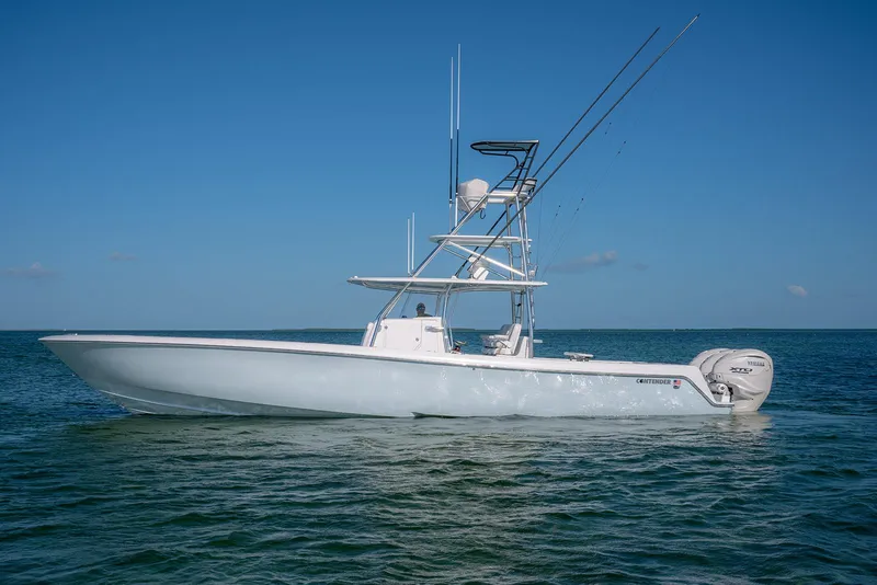 Slide: The Image of 2023 Contender 44 ST boat on calm water. - 6