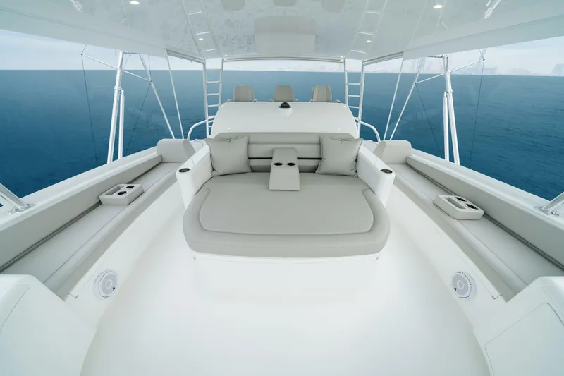 Slide: The Image of 2025 Viking 82 Convertible yacht interior with luxurious seating and ocean view. - 37