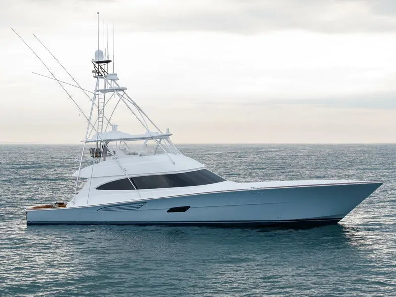 Slide: The Image of 2025 Viking 82 Convertible yacht on open water, sleek design, luxury fishing vessel. - 47