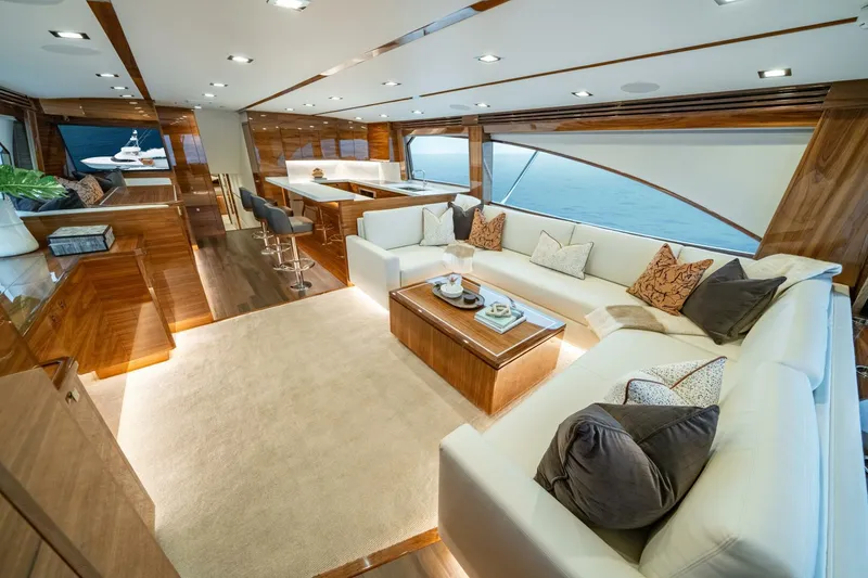 Slide: The Image of Luxurious interior of 2025 Viking 82 Convertible yacht with elegant seating and modern design. - 7