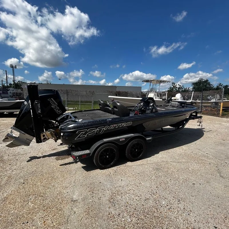 Slide: The Image of 2019 Nitro Z20 Pro boat on a trailer under a clear blue sky. - 11