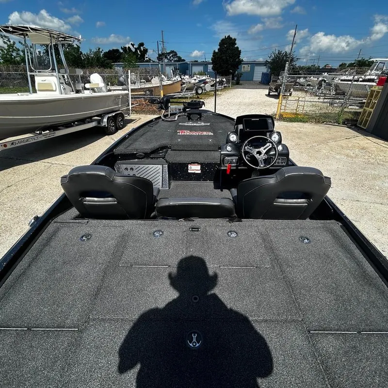 Slide: The Image of 2019 Nitro Z20 Pro bass boat interior with dual seats and steering console. - 13
