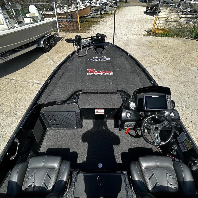 Slide: The Image of 2019 Nitro Z20 Pro fishing boat interior with steering console and seating. - 14