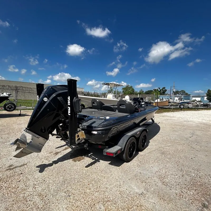 Slide: The Image of 2019 Nitro Z20 Pro boat on a trailer under a clear blue sky. - 2