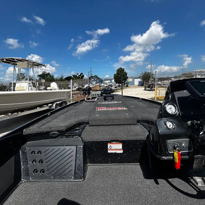 Slide: The Image of 2019 Nitro Z20 Pro bass boat under clear blue sky. - 21