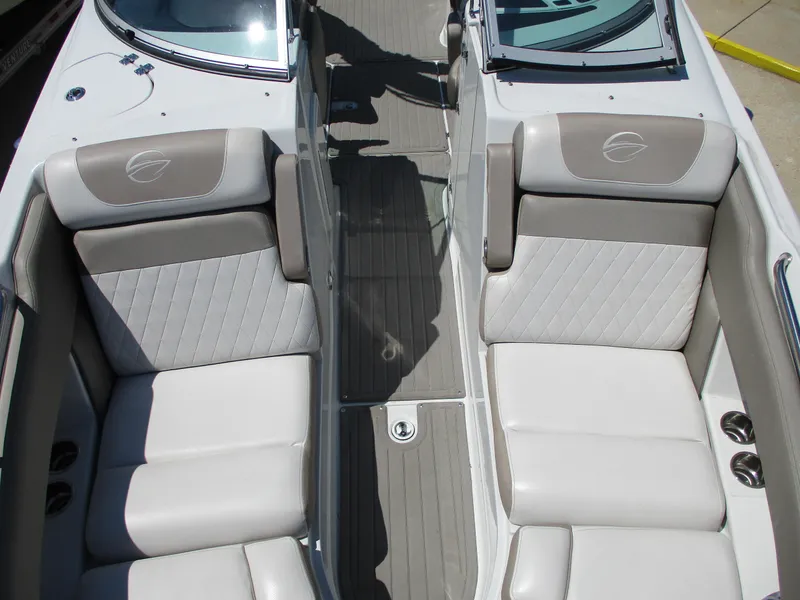 Slide: The Image of 2019 Crownline Eclipse E255 boat interior with gray and white seating. - 10