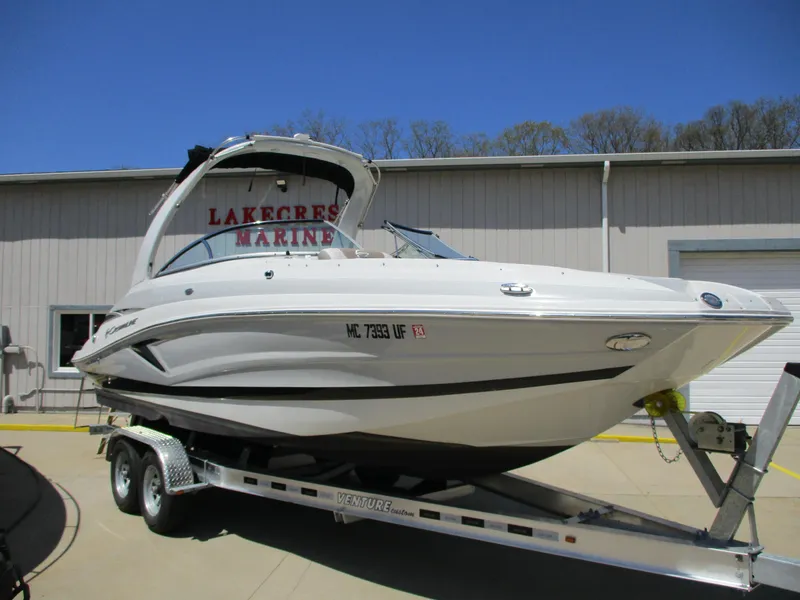 Slide: The Image of 2019 Crownline Eclipse E255 boat on trailer at Lakecrest Marine. - 2