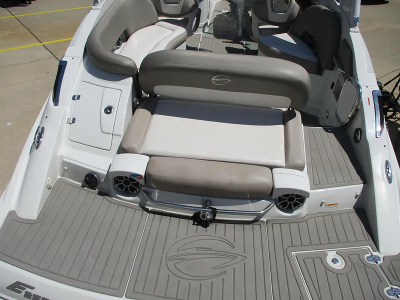 Slide: The Image of 2019 Crownline Eclipse E255 boat interior with seating and speakers. - 3