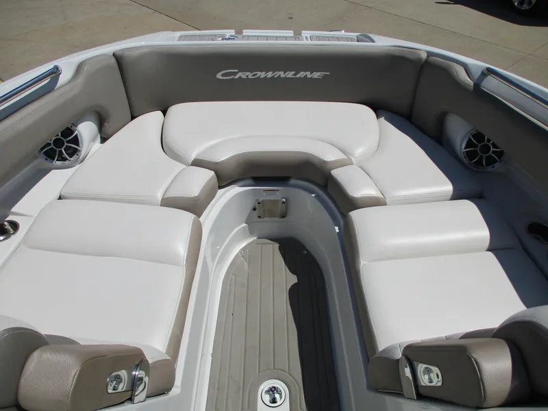Slide: The Image of 2019 Crownline Eclipse E255 boat interior seating area with gray and white upholstery. - 9