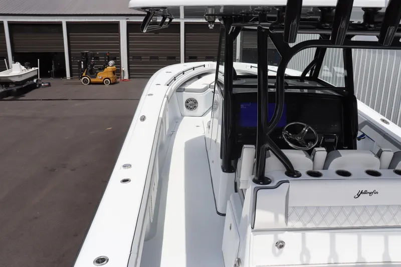 Slide: The Image of 2024 Yellowfin 39 Offshore boat with sleek design and modern console. - 19