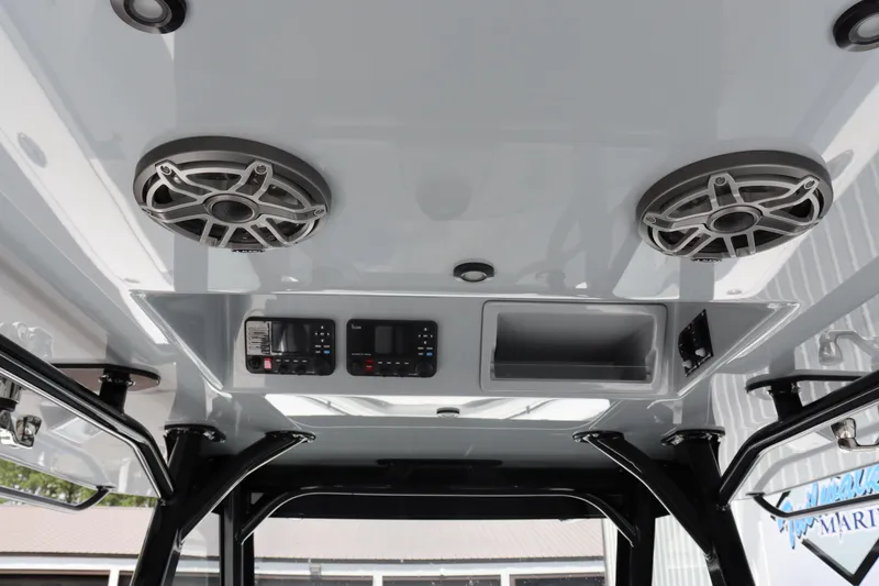 Slide: The Image of 2024 Yellowfin 39 Offshore boat interior with speakers and control panel. - 23