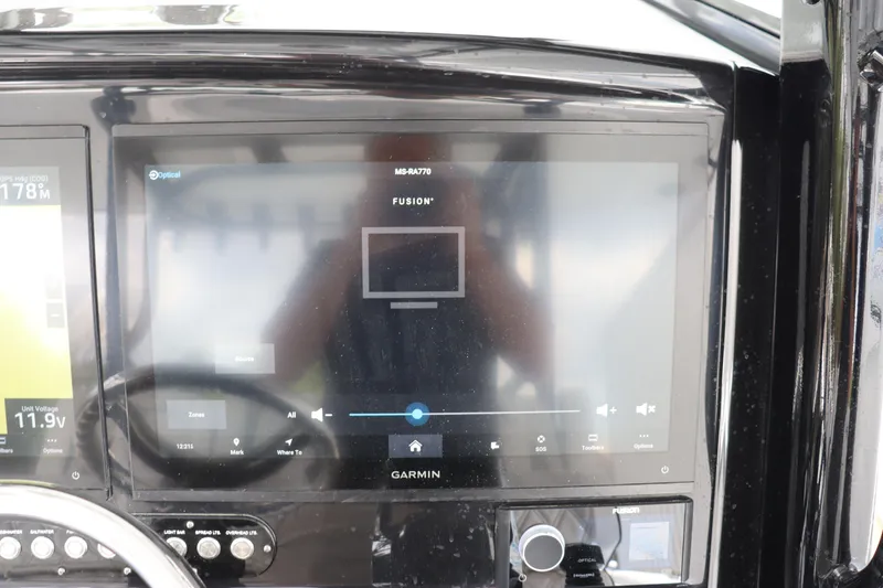 Slide: The Image of Garmin display on 2024 Yellowfin 39 Offshore boat dashboard. - 28