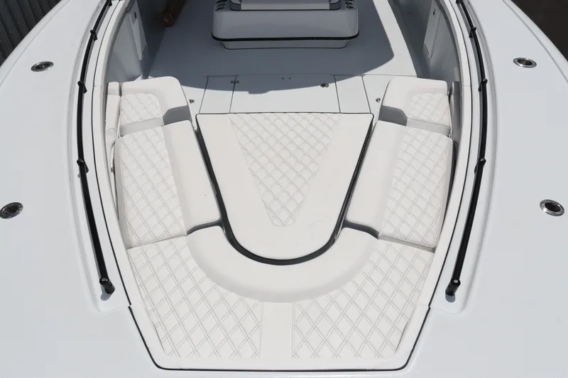 Slide: The Image of 2024 Yellowfin 39 Offshore boat with cushioned bow seating area. - 6